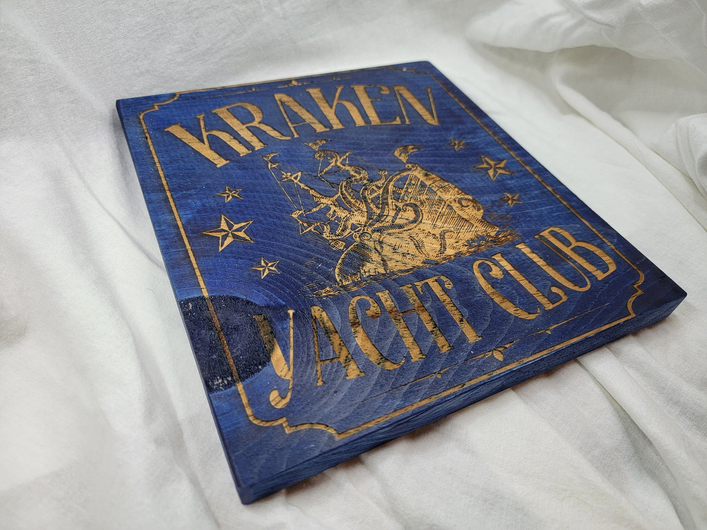 KRAKEN YACHT CLUB blue stained solid wood wall & shelf decor inspired by Scandinavian folklore display this nautical themed plaque proudly
